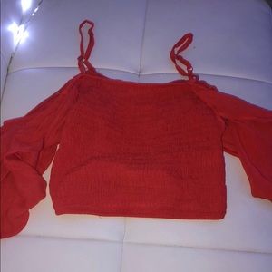 red tank top with ruffle sleeves